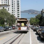 Streetcar at top of Lomard St facing Alcatraz